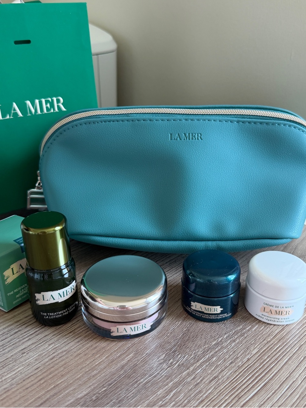 La Mer Lip polish, La Mer moisturizing and night cream, Cosmetic Pouch